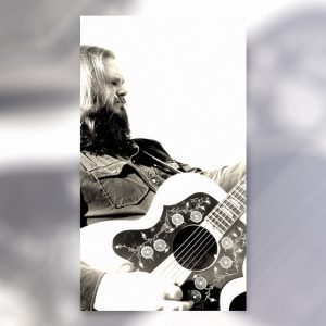 Whitey Morgan with an acoustic guitar